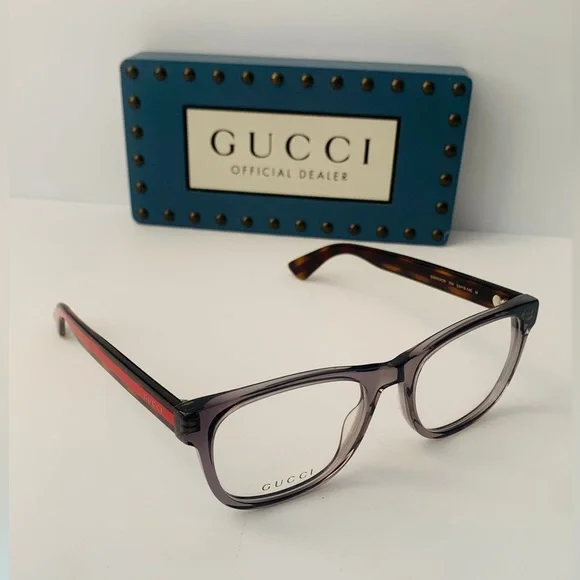 Gucci's GG0004ON features soft lines frames acetate front. Iconic web effect